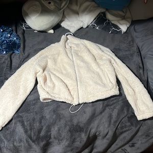 Fluffy white/cream sweater with adjusting straps